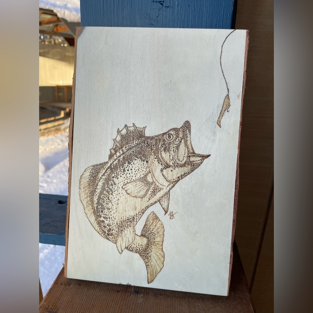 Wood burned bass fish